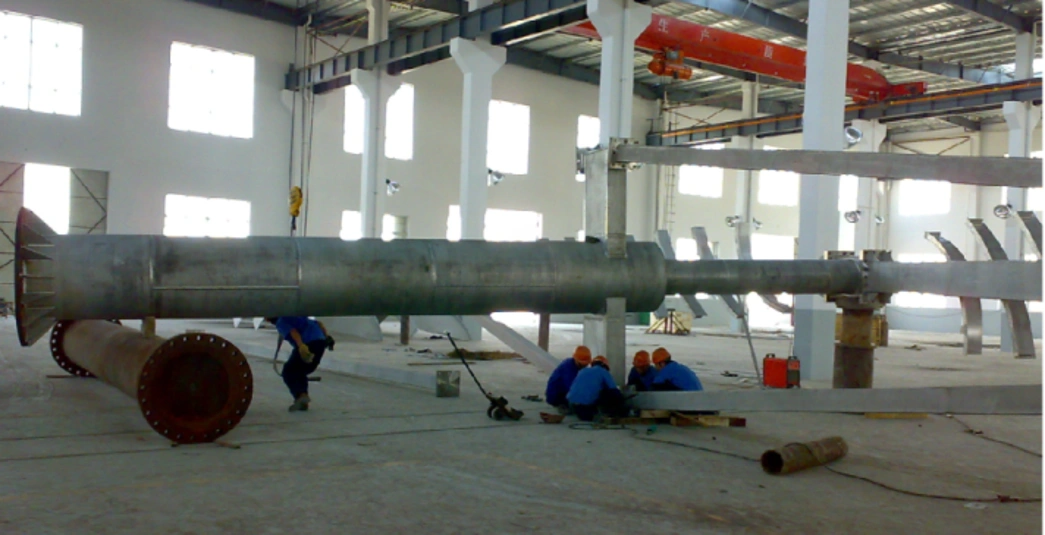 Workers Assembling a Large-Scale Thickener Rake Mechanism in Industrial Manufacturing Facility